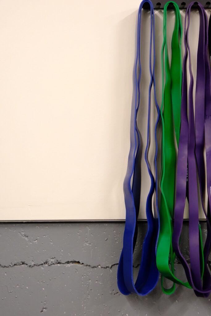 resistance bands hanging on a wall